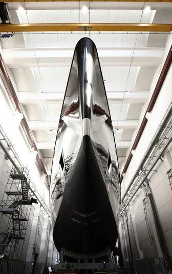 a black and white dress in a building aboard BADIS I Yacht for Sale