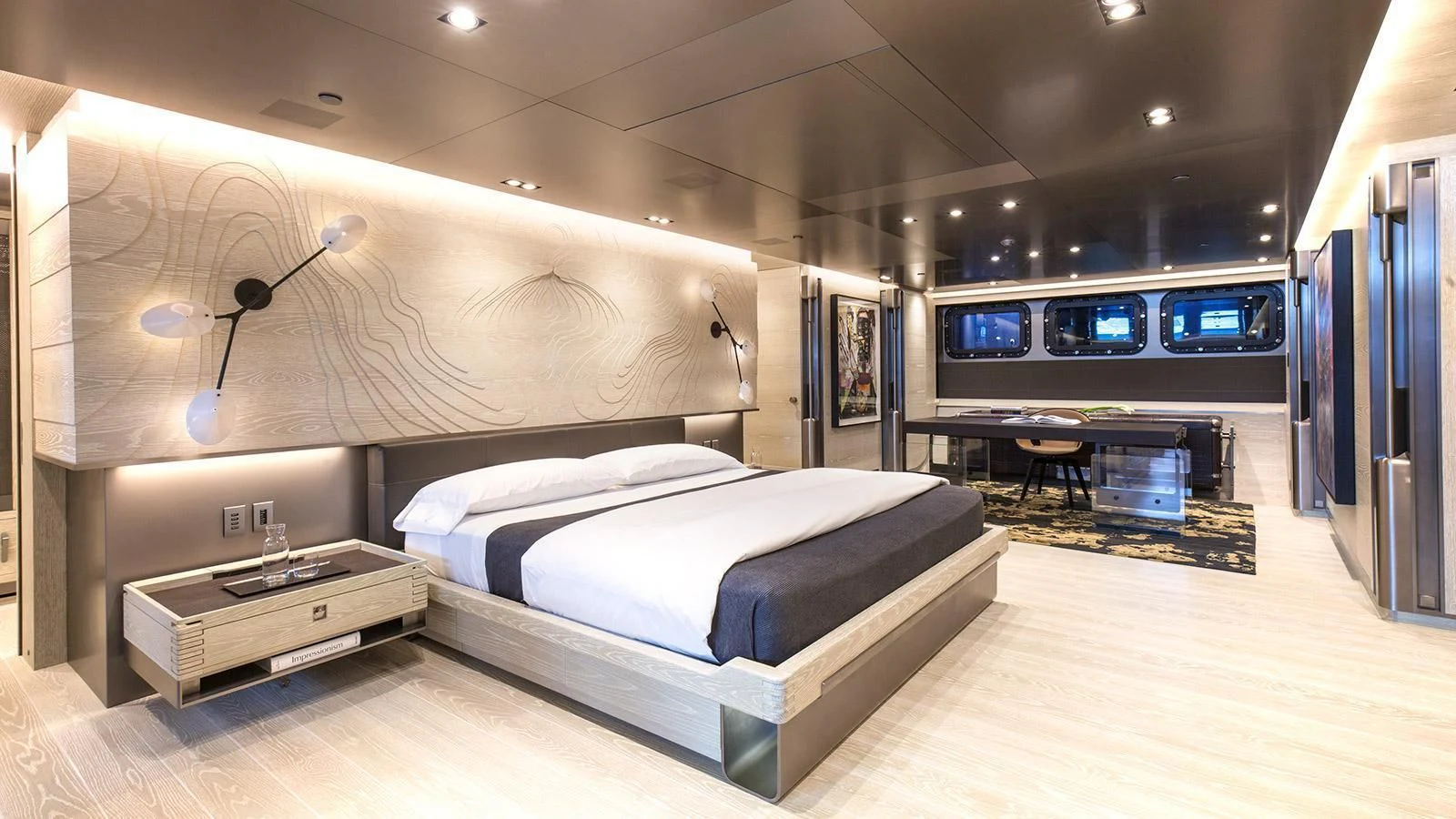 a room with a bed and a desk aboard BADIS I Yacht for Sale