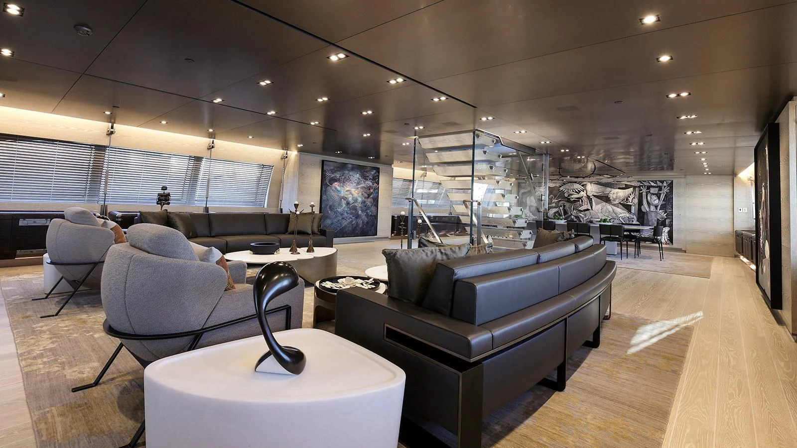 a large room with a couch and a table aboard BADIS I Yacht for Sale