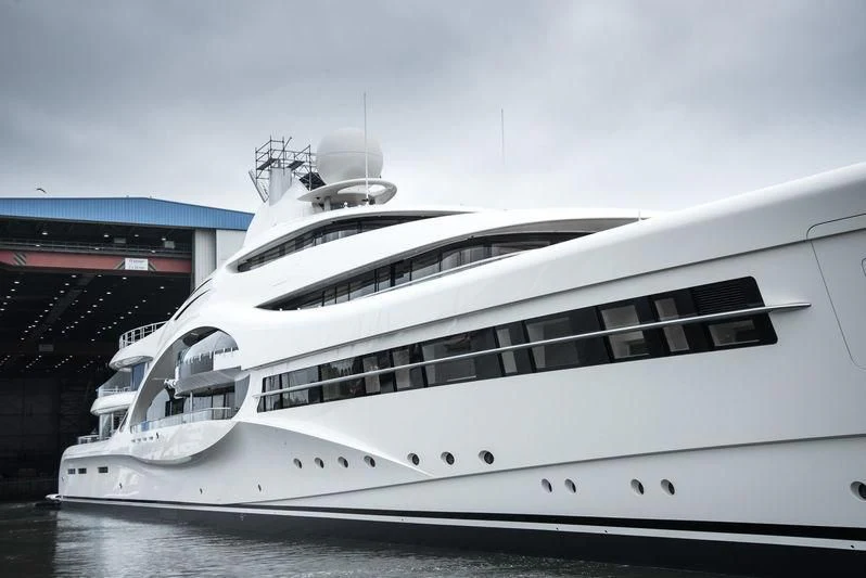 a white yacht in the water aboard AMBASSADOR Yacht for Sale