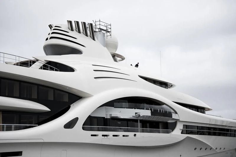 a white yacht in the water aboard AMBASSADOR Yacht for Sale