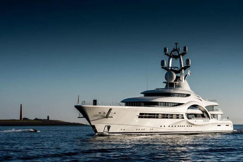 a white yacht in the water aboard AMBASSADOR Yacht for Sale