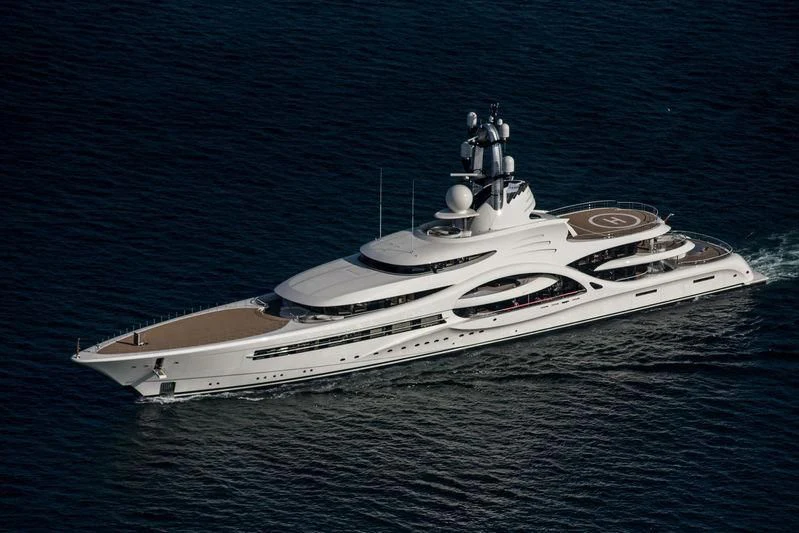 a white yacht in the water aboard AMBASSADOR Yacht for Sale