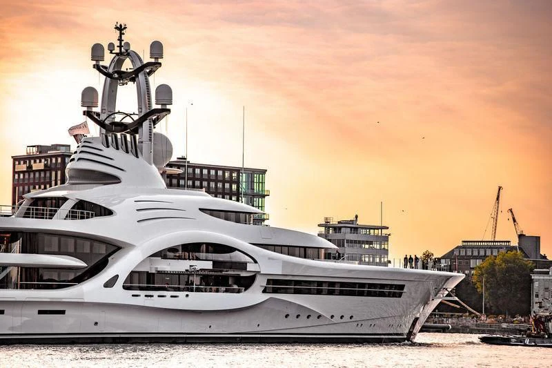 a large white yacht aboard AMBASSADOR Yacht for Sale