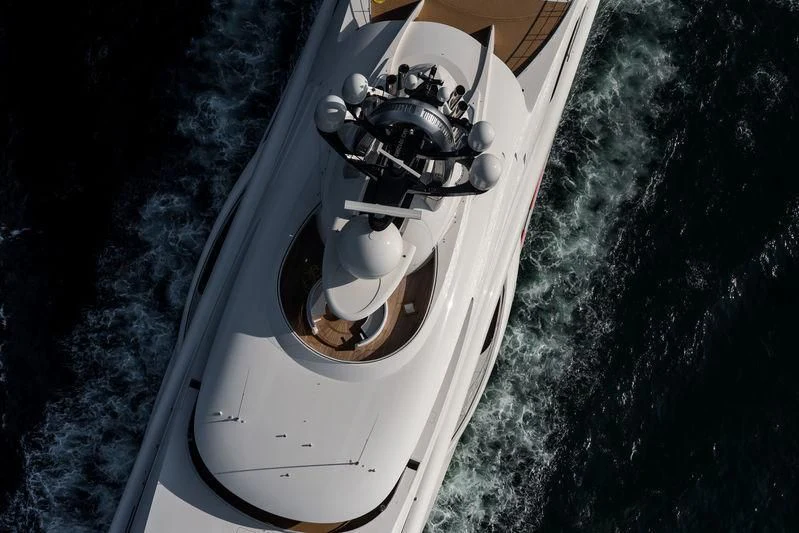 a white car with a black background aboard AMBASSADOR Yacht for Sale