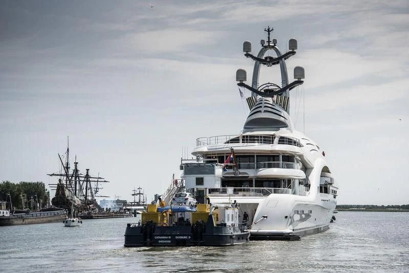 a large white boat in the water aboard AMBASSADOR Yacht for Sale