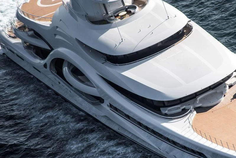 a white boat on the water aboard AMBASSADOR Yacht for Sale