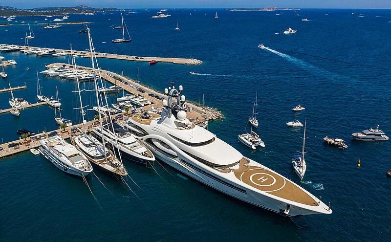 a group of boats in a harbor aboard AMBASSADOR Yacht for Sale