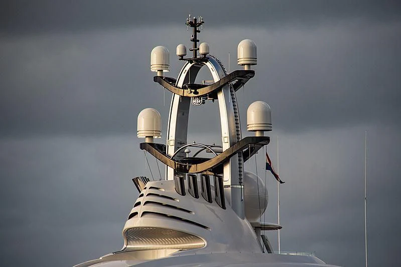 a white boat with a satellite dish on it aboard AMBASSADOR Yacht for Sale