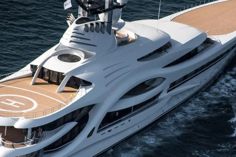 a white boat on the water aboard AMBASSADOR Yacht for Sale