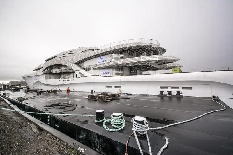 a large cruise ship docked aboard AMBASSADOR Yacht for Sale