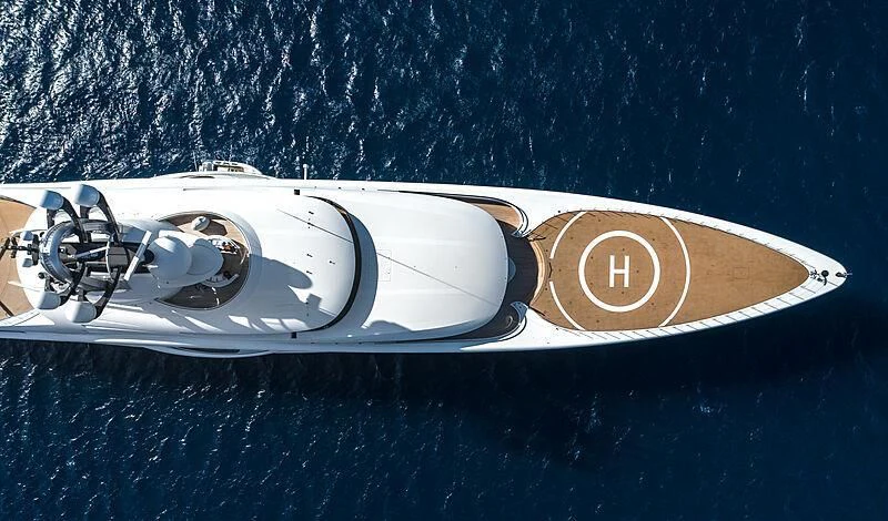 a silver and gold boat aboard AMBASSADOR Yacht for Sale