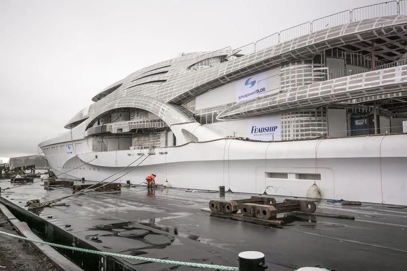 a large white building with a crane aboard AMBASSADOR Yacht for Sale