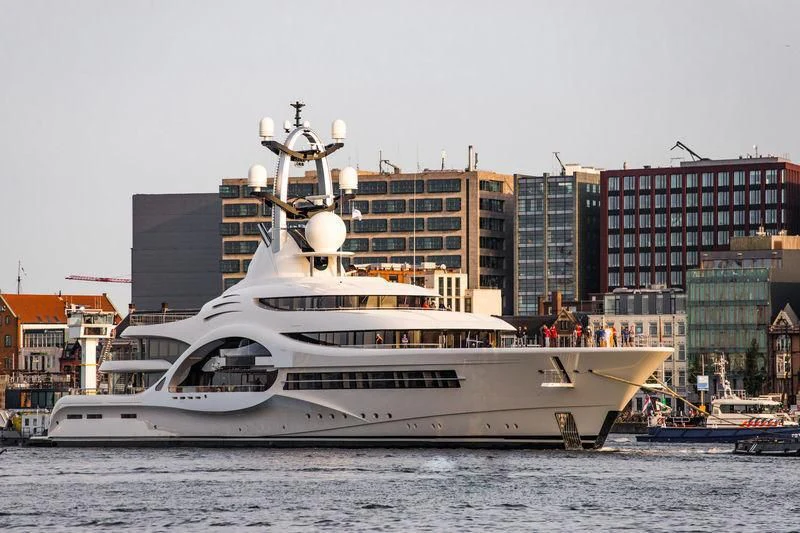 a large ship in the water aboard AMBASSADOR Yacht for Sale