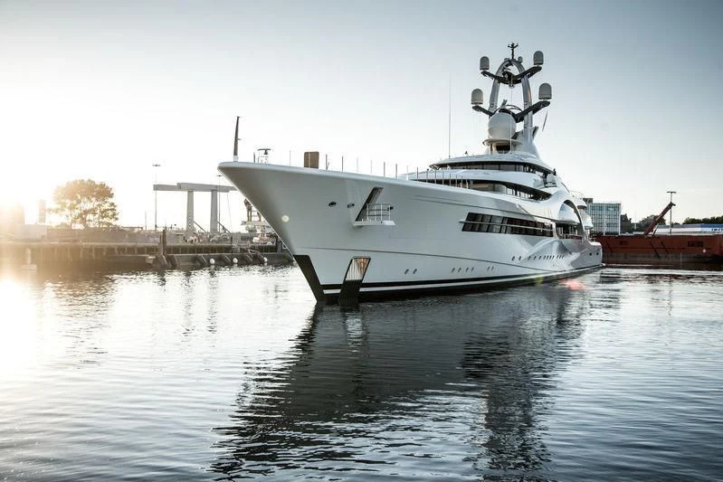 a white boat on water aboard AMBASSADOR Yacht for Sale