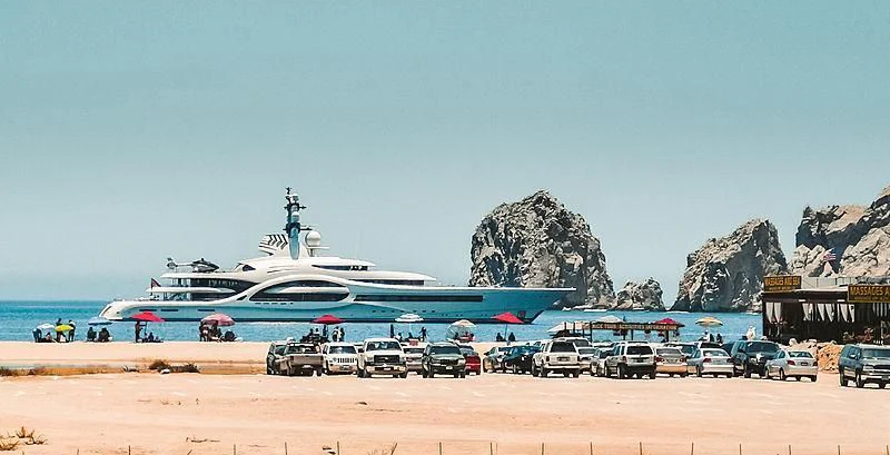 a large ship docked at a port aboard AMBASSADOR Yacht for Sale