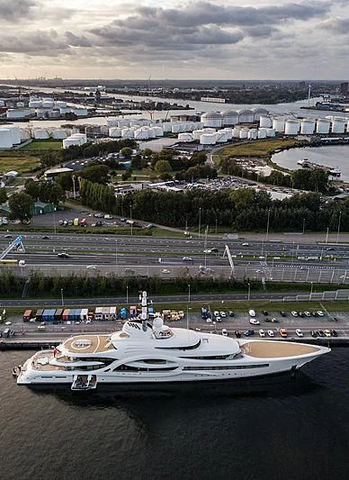 a boat in a harbor aboard AMBASSADOR Yacht for Sale