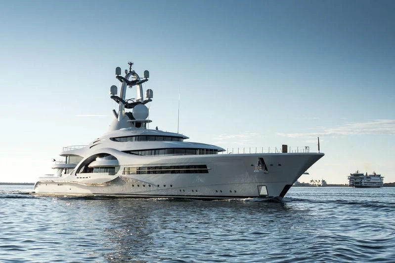 a large white ship in the water aboard AMBASSADOR Yacht for Sale