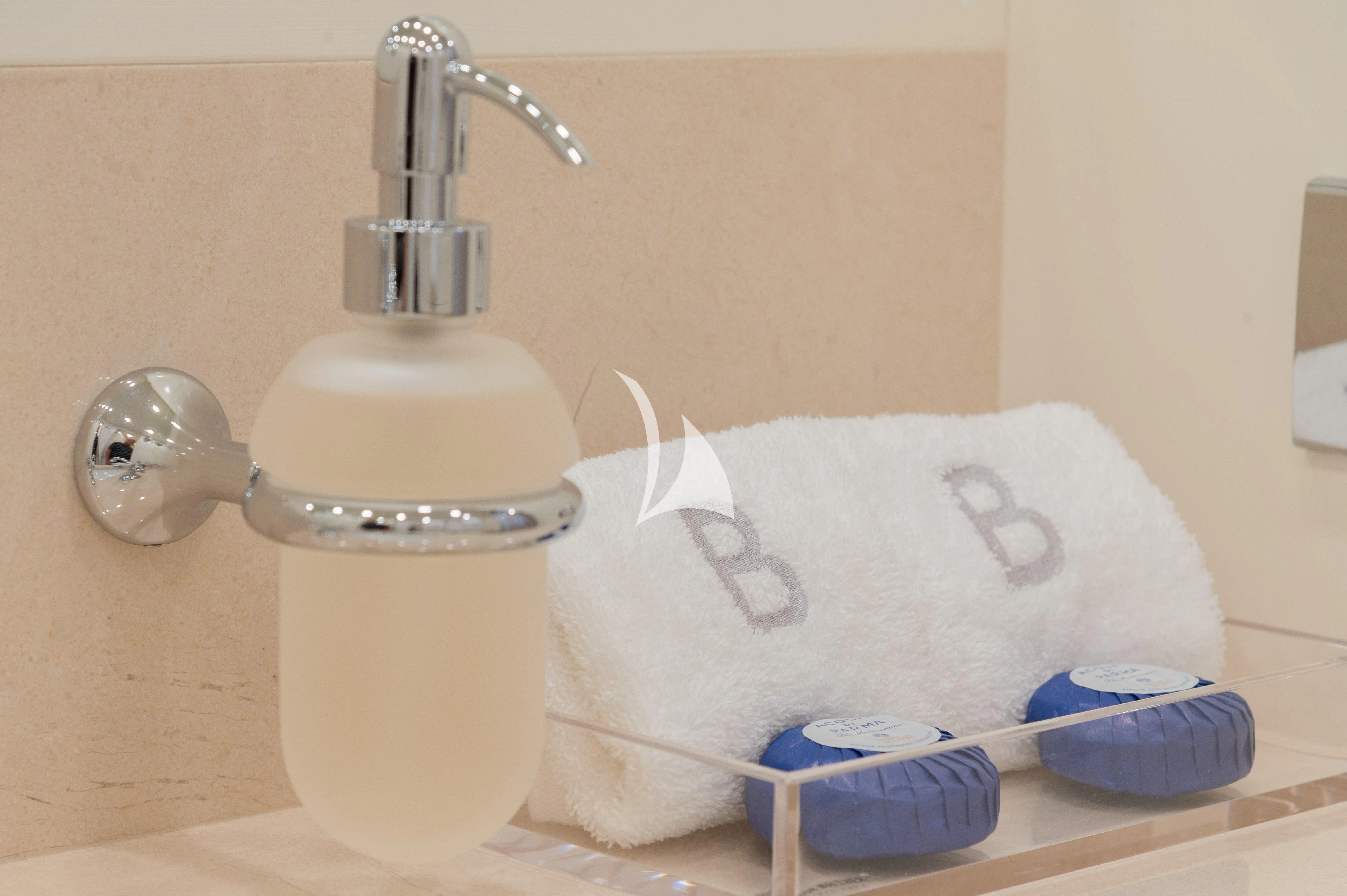 a toilet with a towel on it aboard BOJI Yacht for Sale