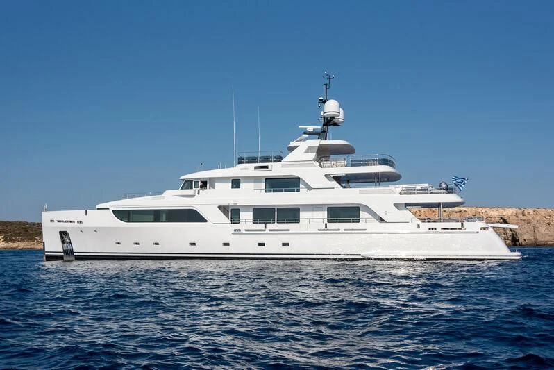 a white yacht on the water aboard BOJI Yacht for Sale