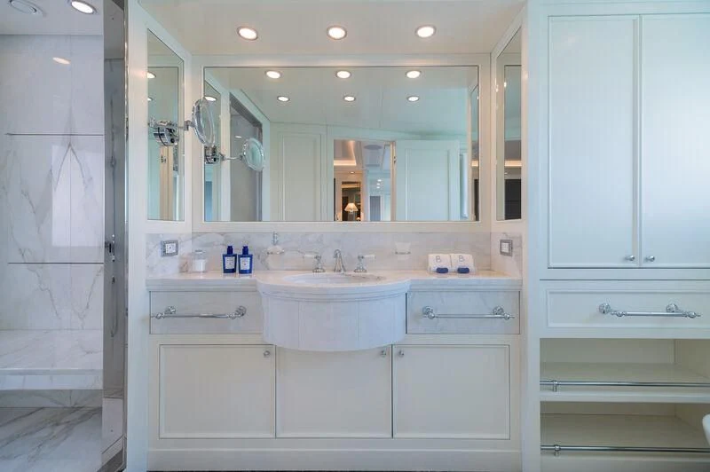 a bathroom with a large mirror aboard BOJI Yacht for Sale