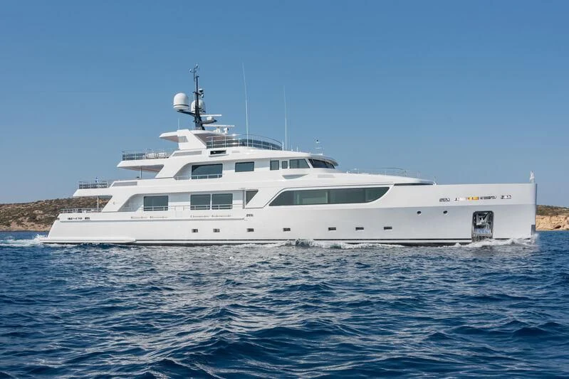 a white yacht on the water aboard BOJI Yacht for Sale