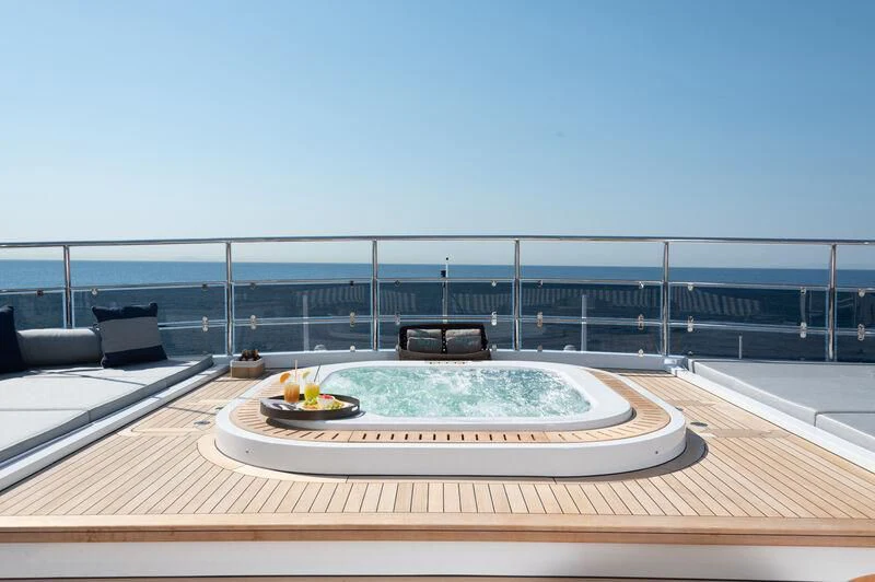 a large white and black roof with a round white circle with a round white circle on it and aboard BOJI Yacht for Sale