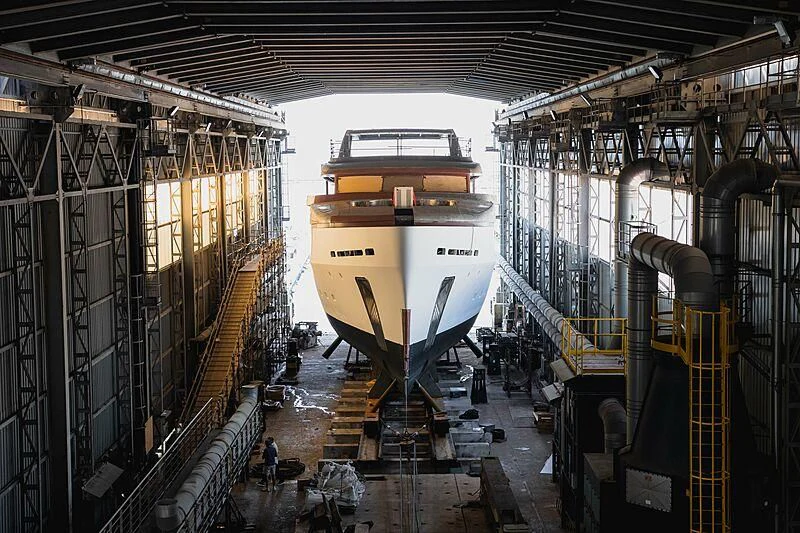 a large machine in a factory aboard BOJI Yacht for Sale