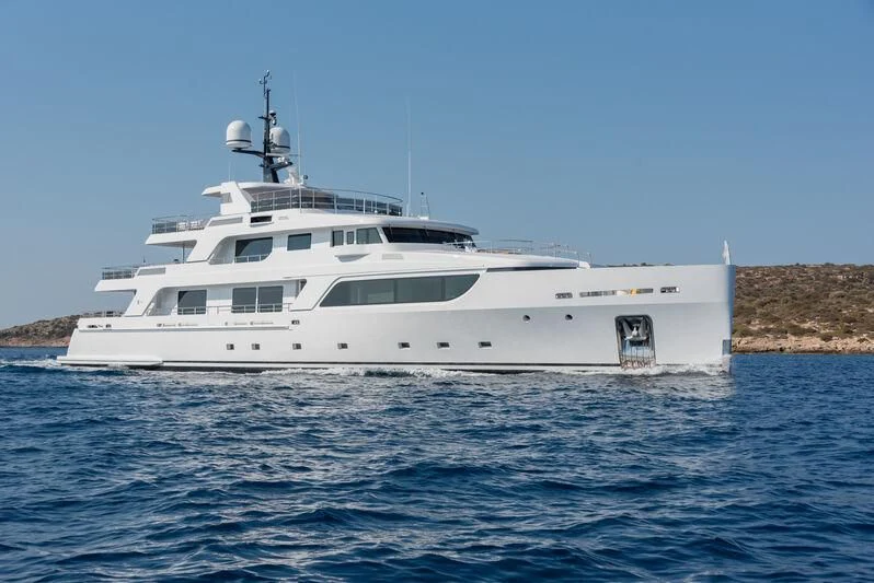 a white yacht in the water aboard BOJI Yacht for Sale