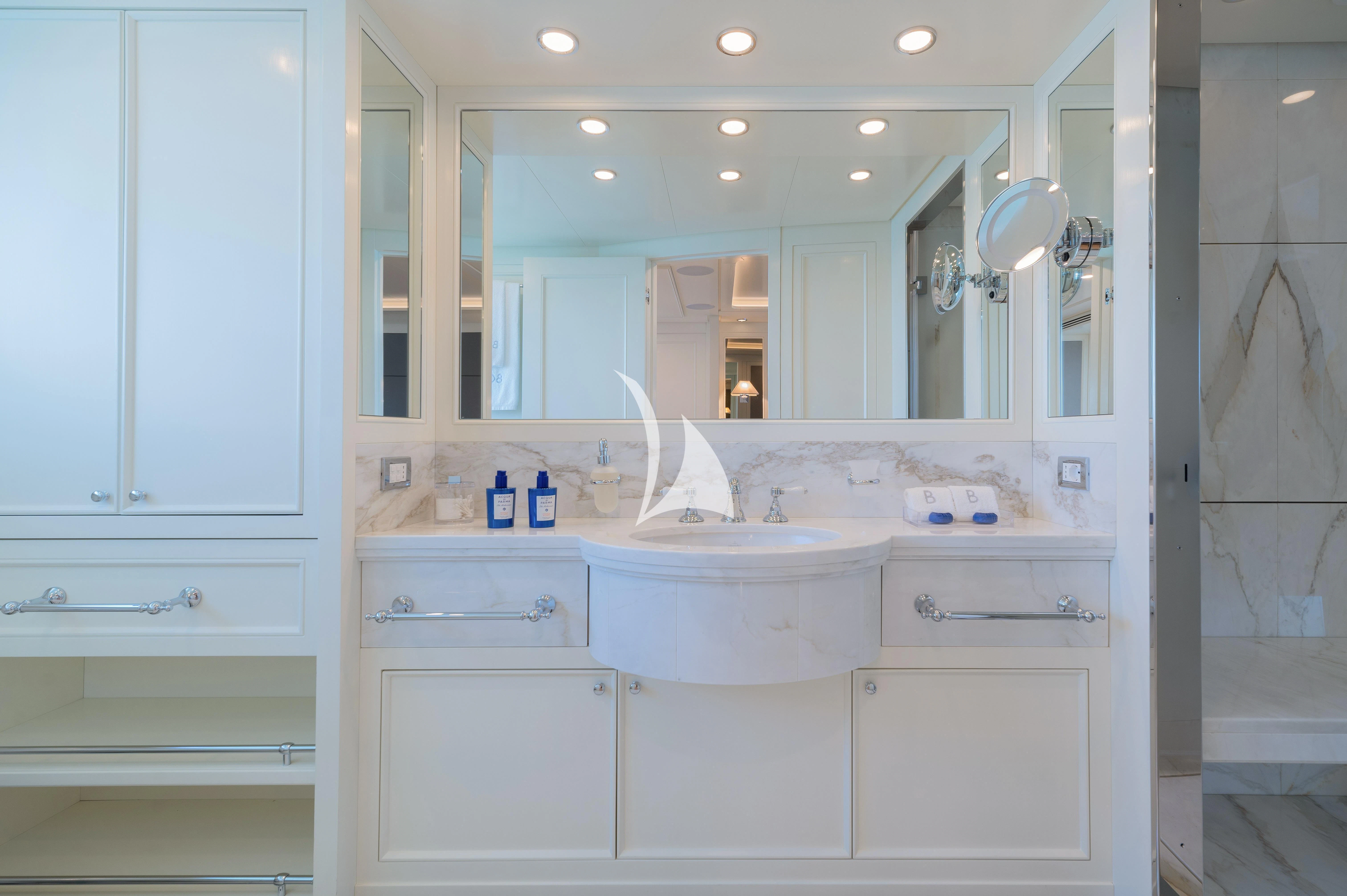 a bathroom with a large mirror aboard BOJI Yacht for Sale
