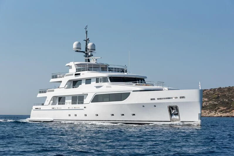 a white yacht in the water aboard BOJI Yacht for Sale
