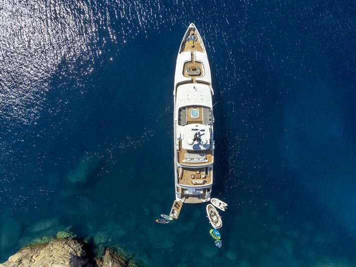 a rocket flying over water aboard BOJI Yacht for Sale