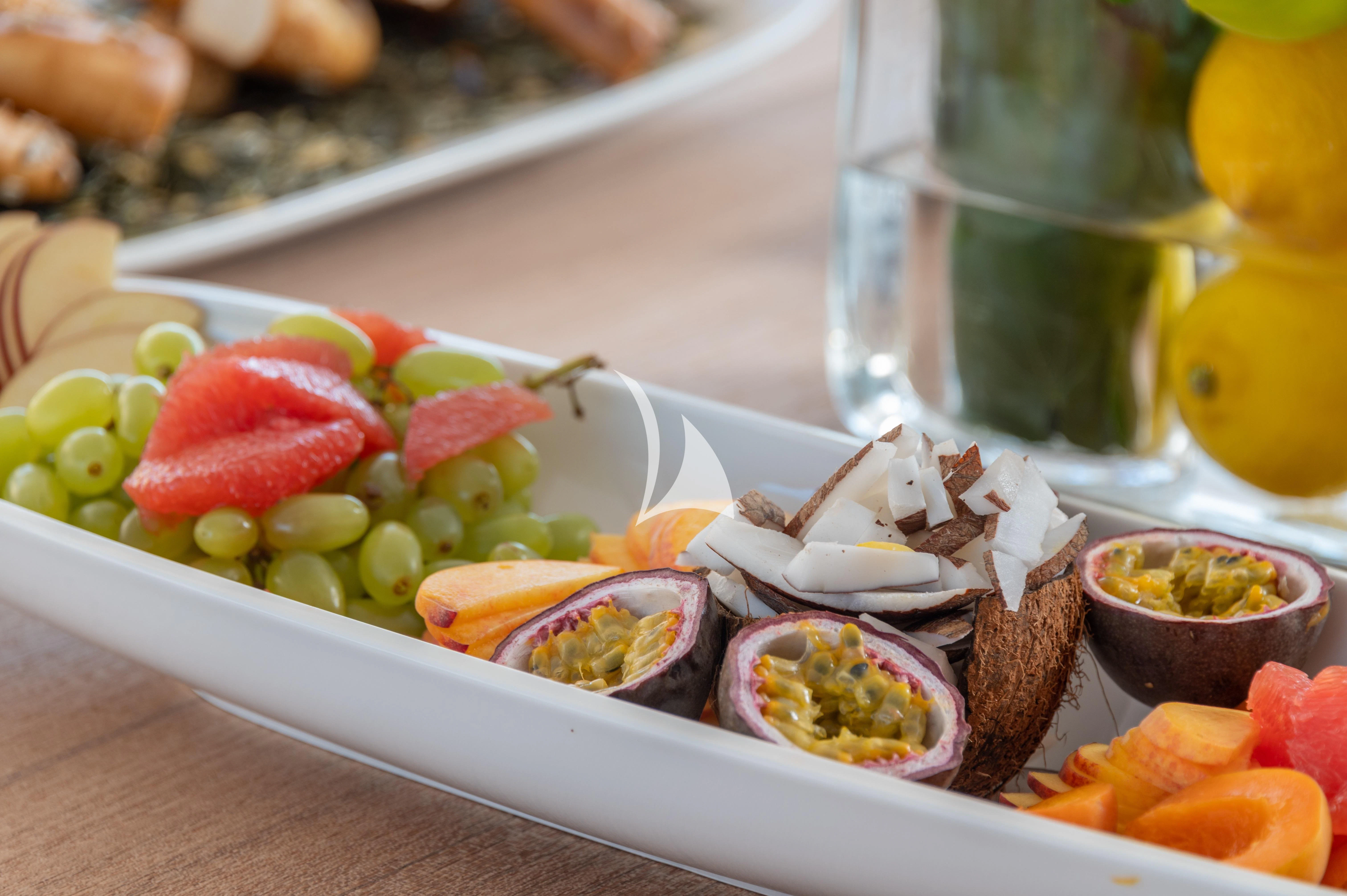 a tray of food aboard BOJI Yacht for Sale