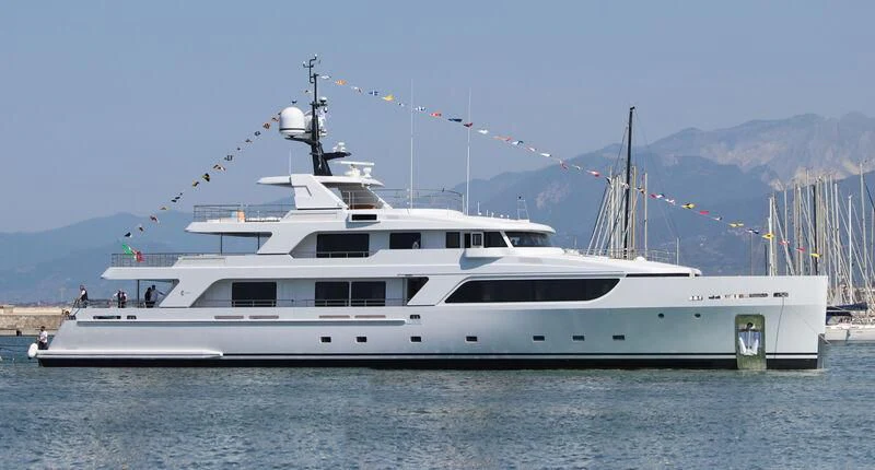 a white yacht on the water aboard BOJI Yacht for Sale