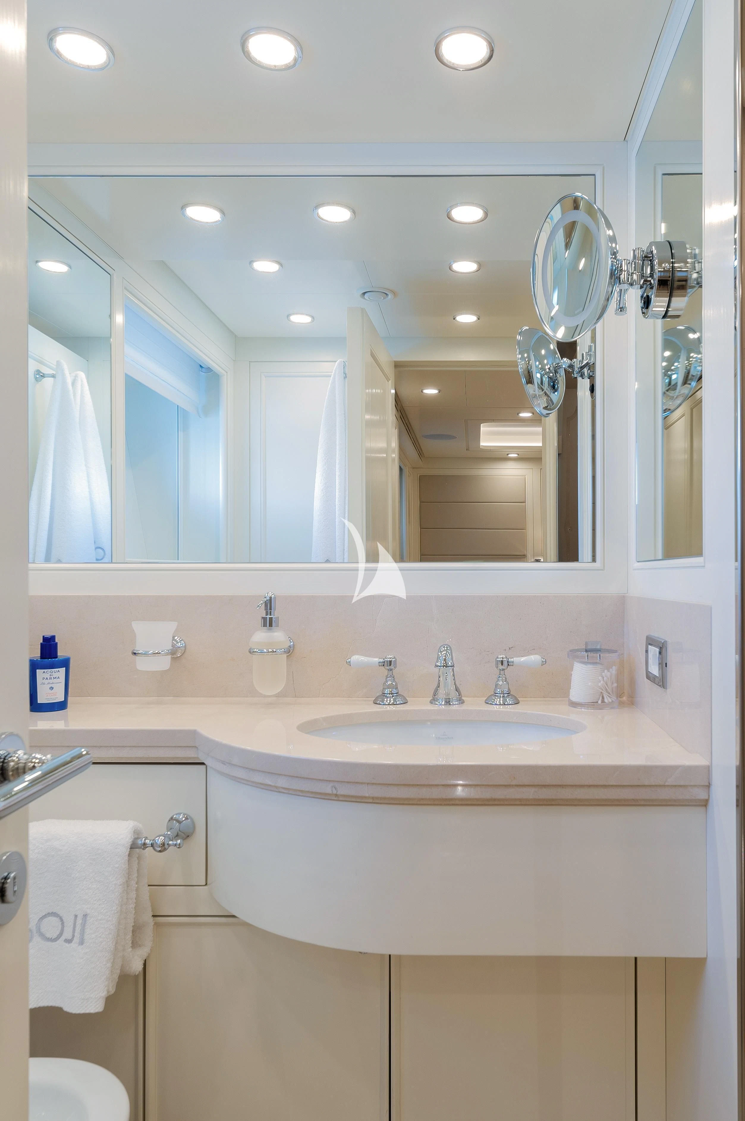 a bathroom with a large mirror aboard BOJI Yacht for Sale