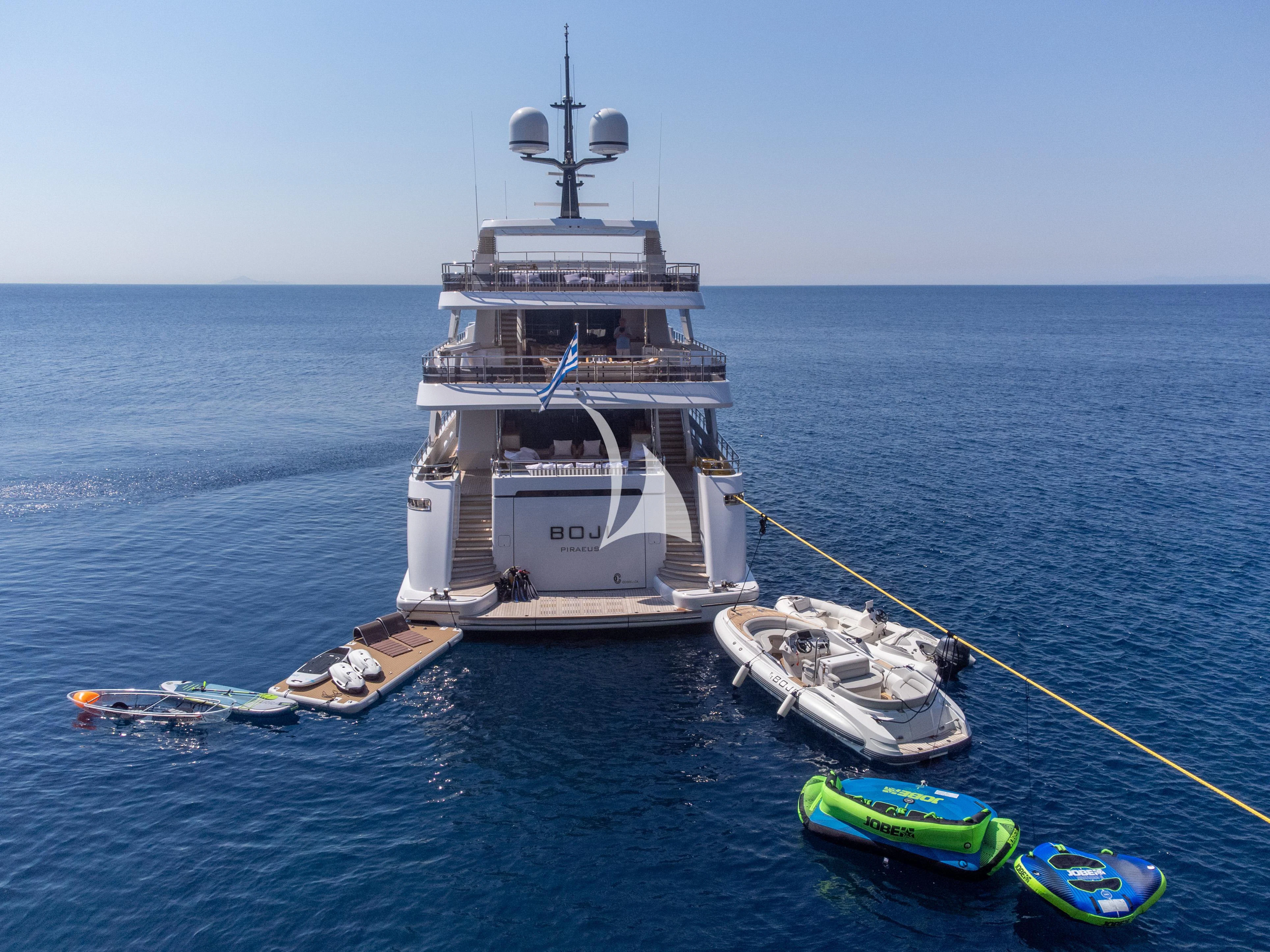 a large ship in the water aboard BOJI Yacht for Sale