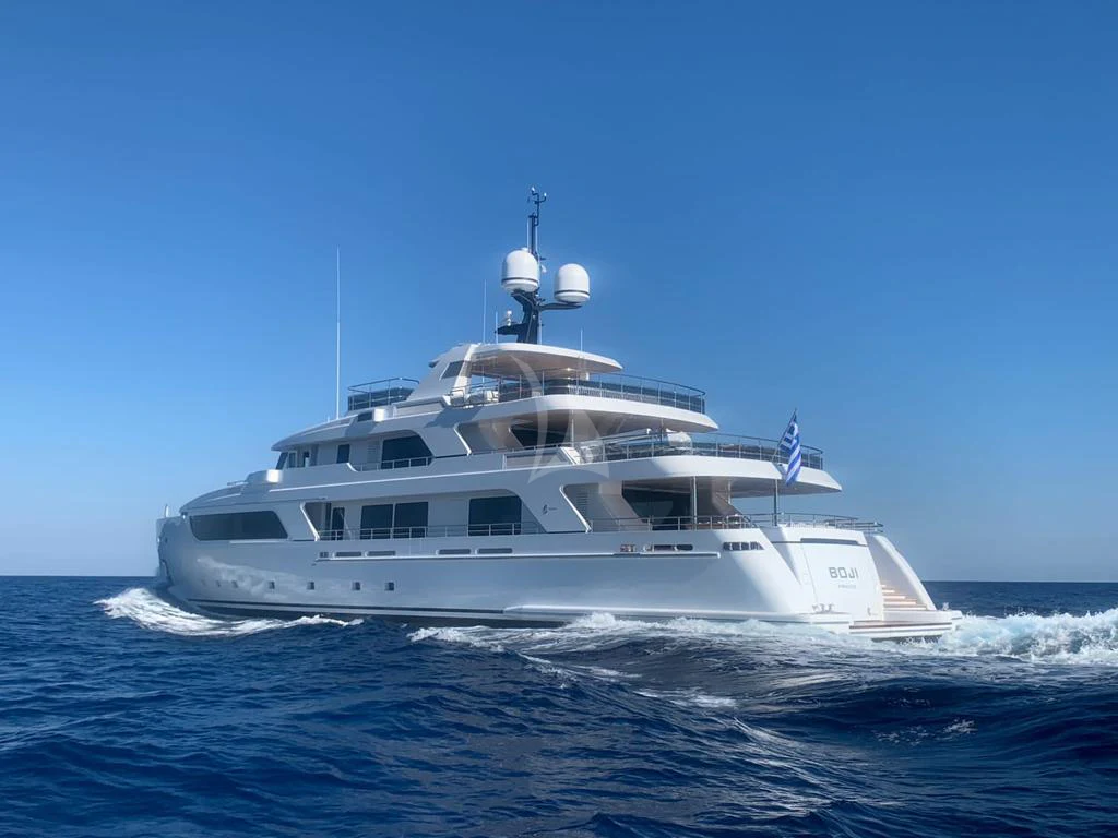 a white yacht in the water aboard BOJI Yacht for Sale