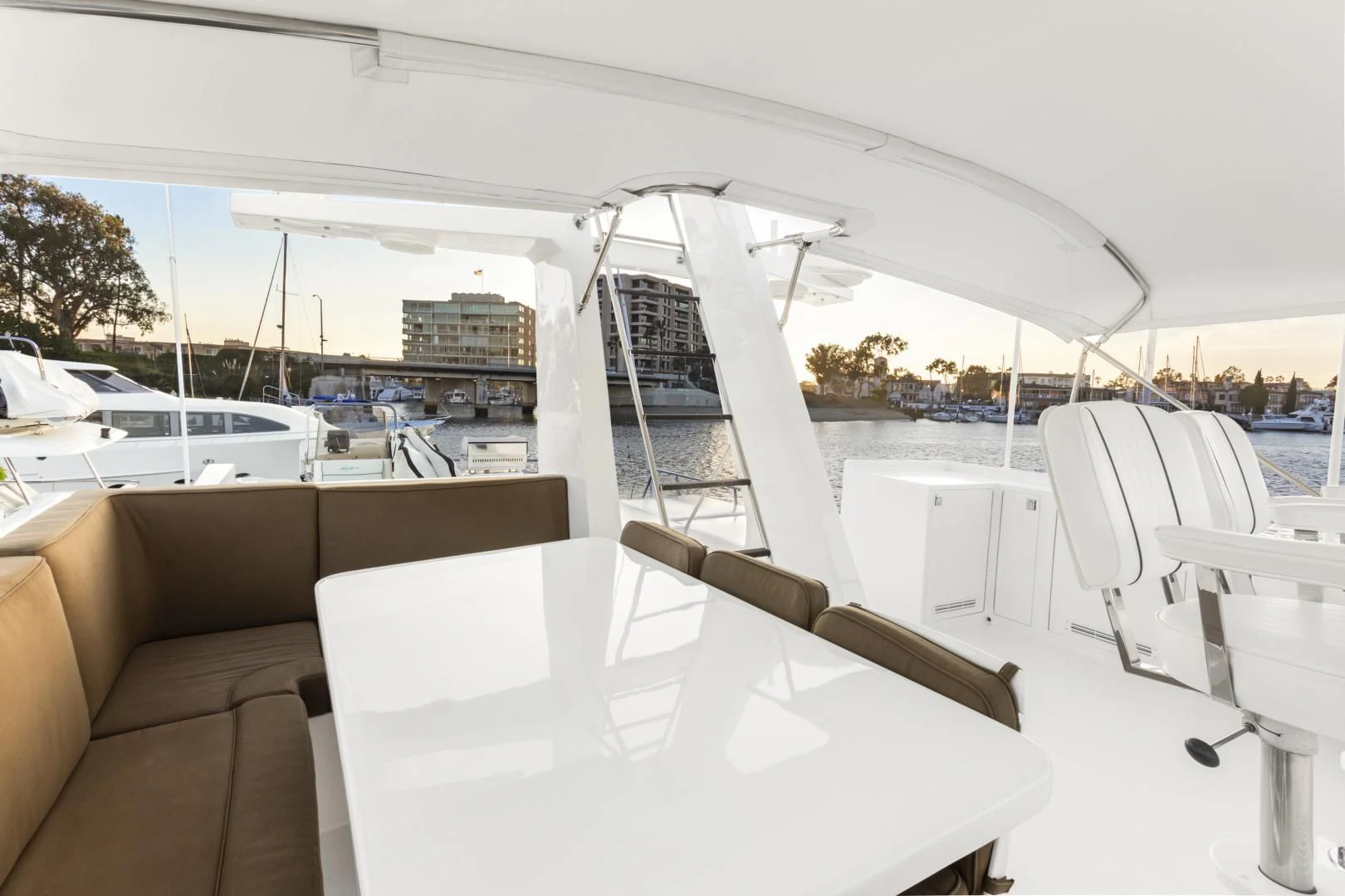 a white table on a boat aboard EL ENCANTO Yacht for Sale