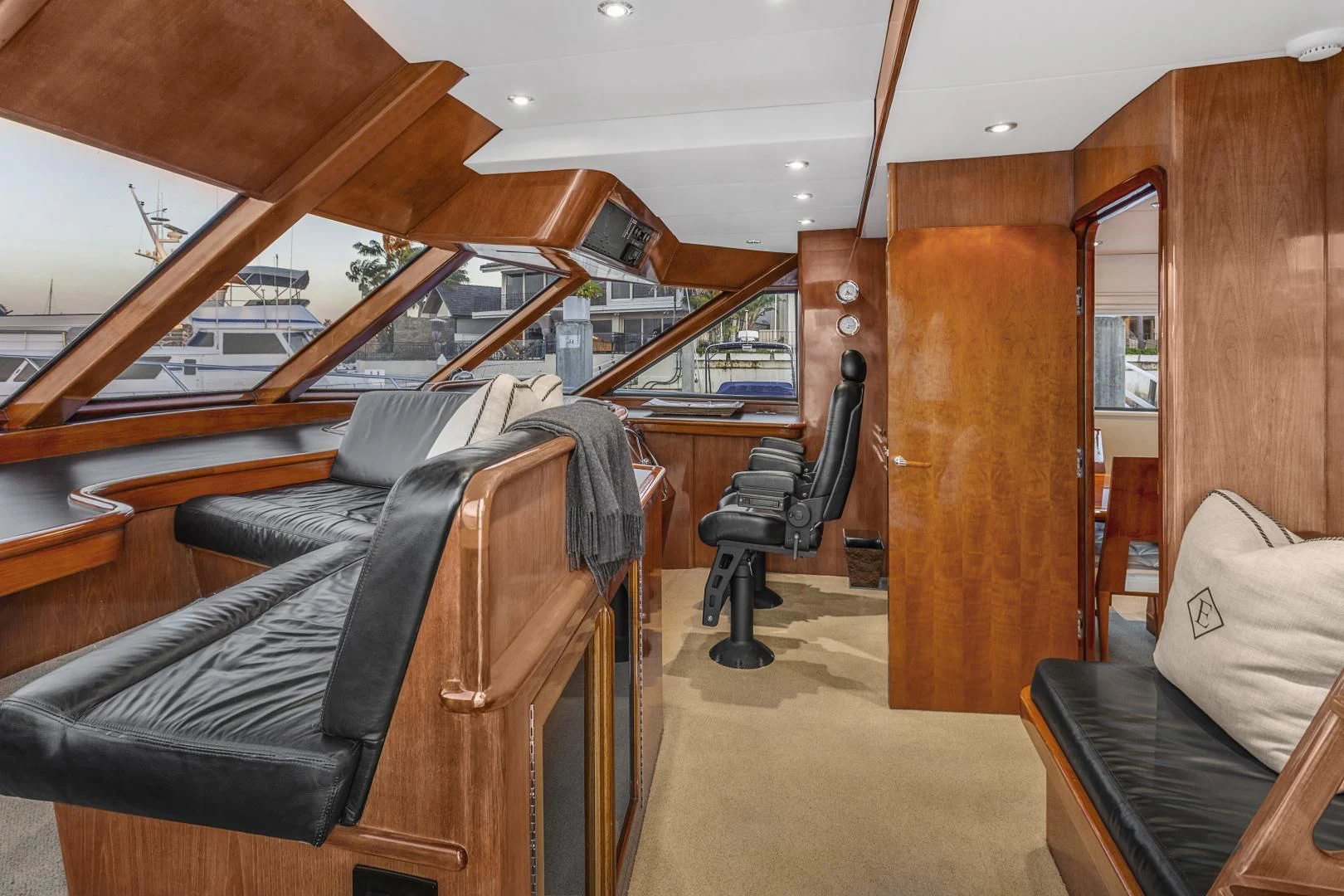 a room with a bunk bed and couches aboard EL ENCANTO Yacht for Sale