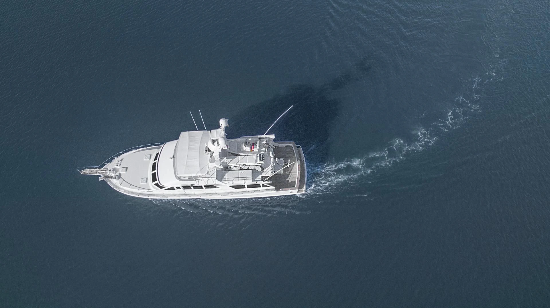 a ship in the ocean aboard EL ENCANTO Yacht for Sale