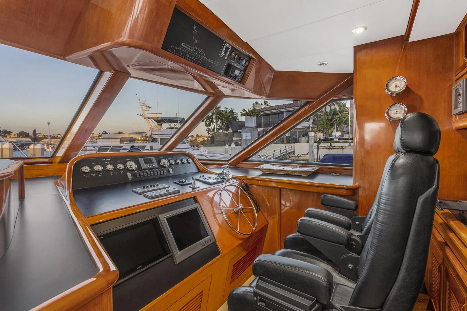 a large wooden piano aboard EL ENCANTO Yacht for Sale