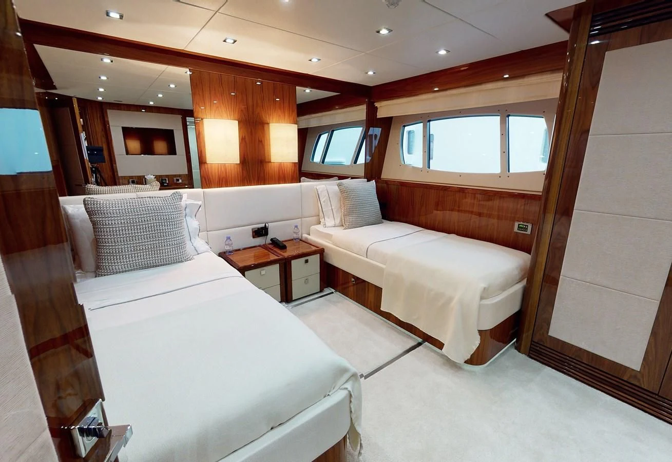 a room with two beds aboard ANYA Yacht for Sale