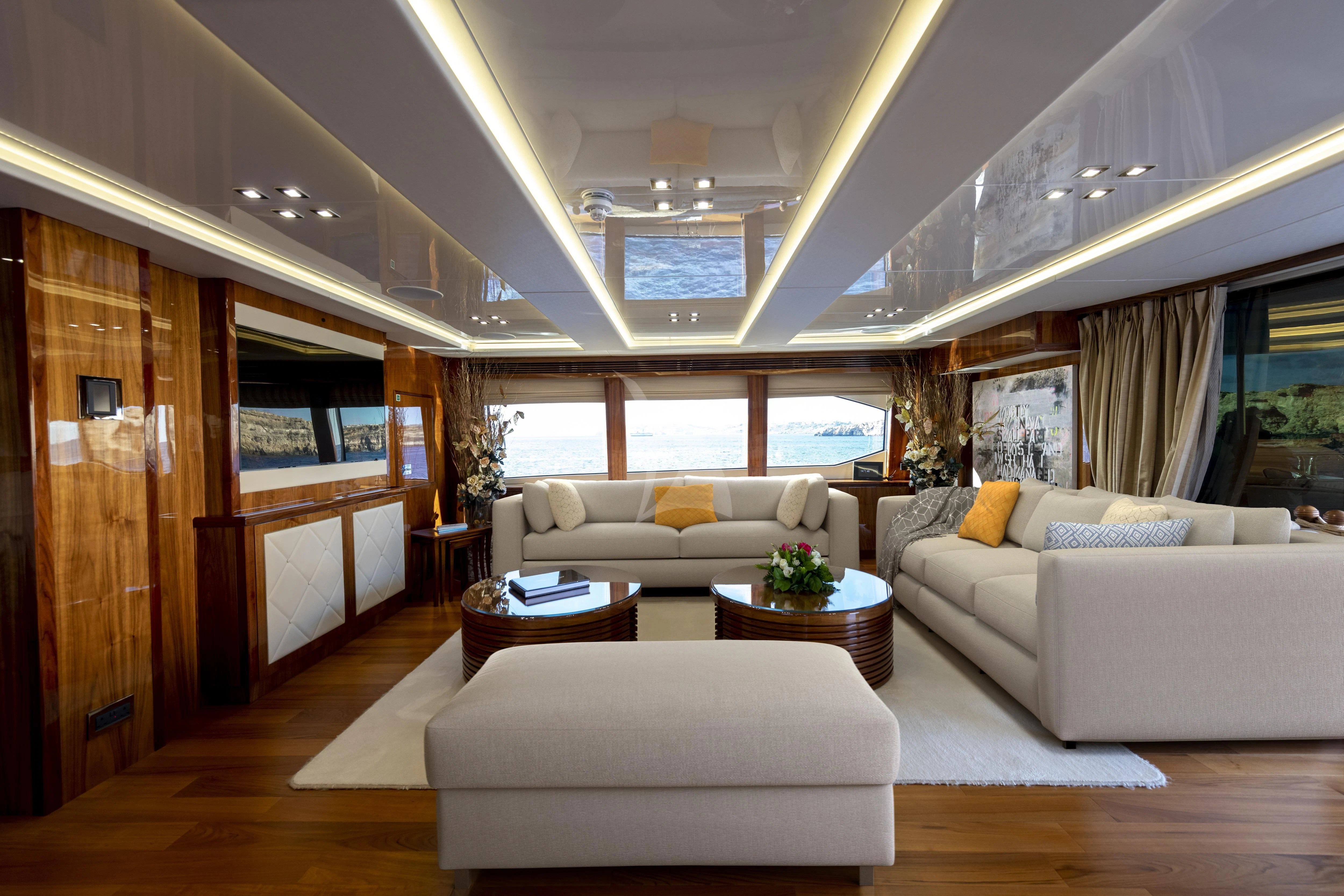 a living room with a large window aboard ANYA Yacht for Sale