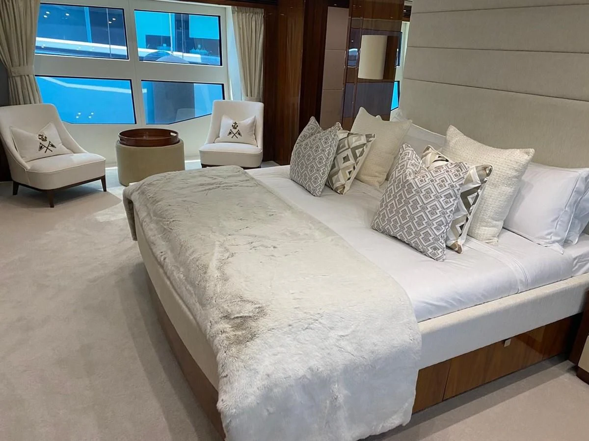 a bed with pillows aboard ANYA Yacht for Sale