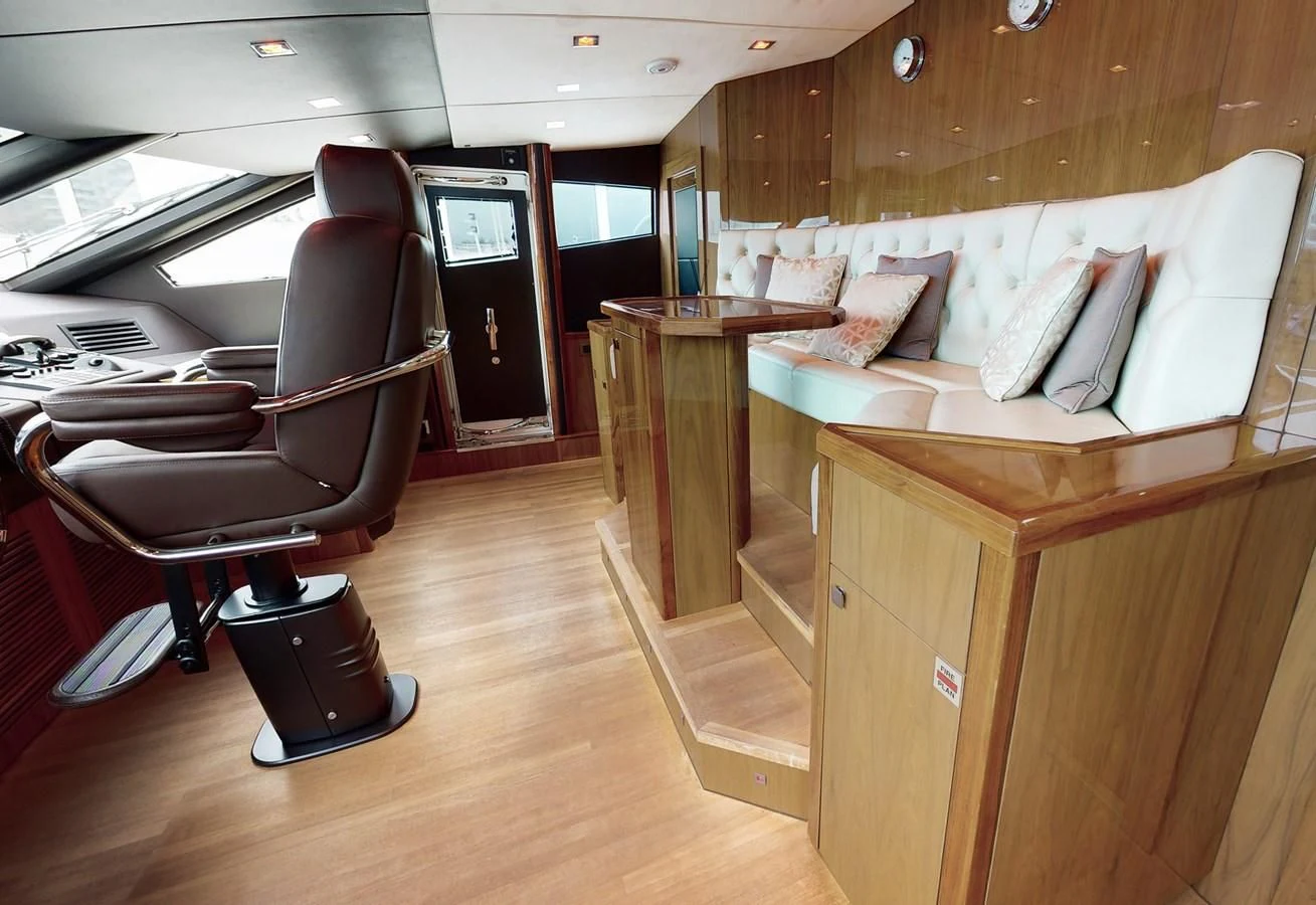 a room with a couch and a desk aboard ANYA Yacht for Sale