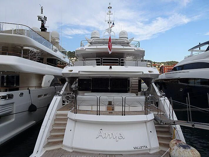 a boat docked at a pier aboard ANYA Yacht for Sale