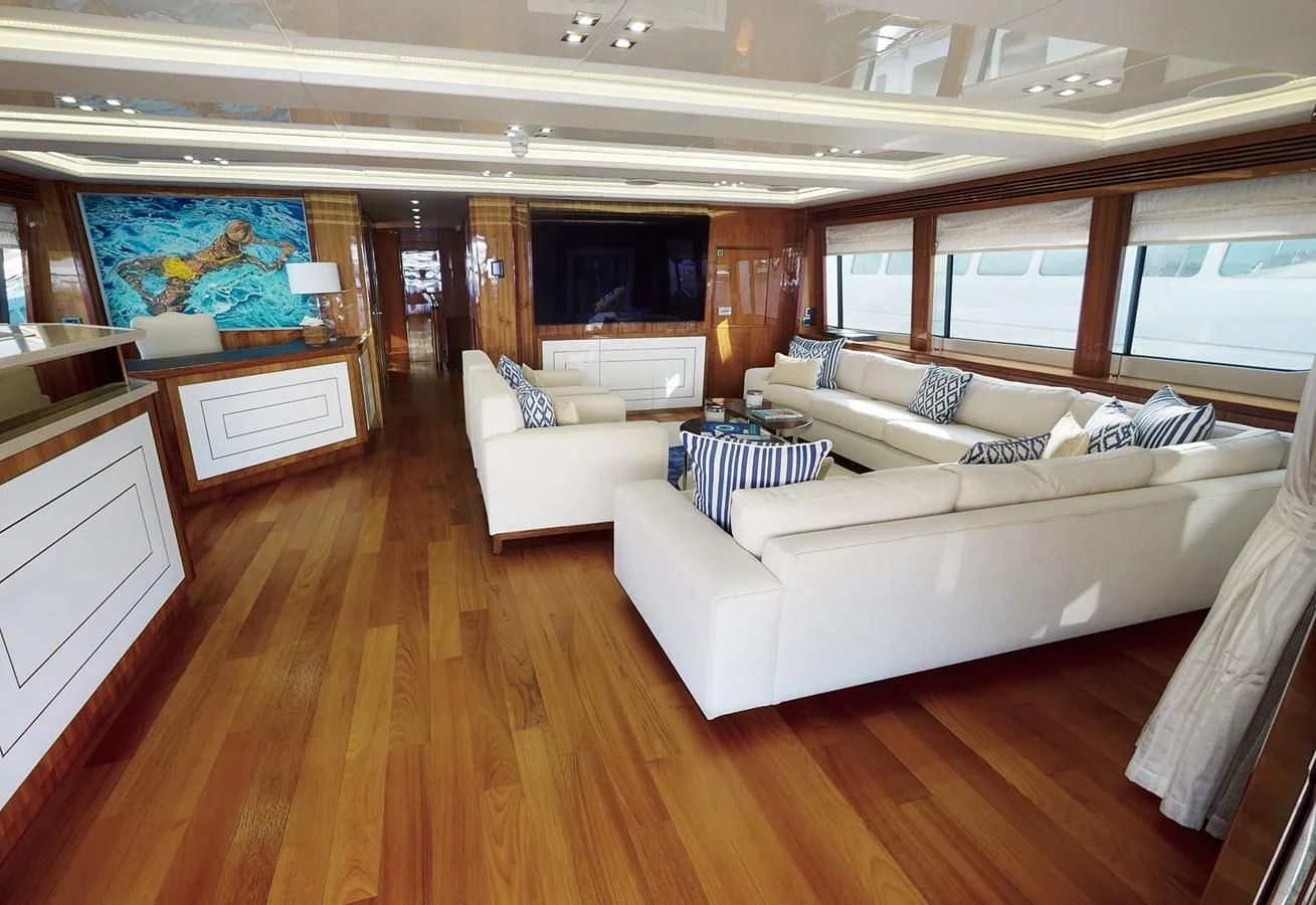 a living room with a wood floor aboard ANYA Yacht for Sale