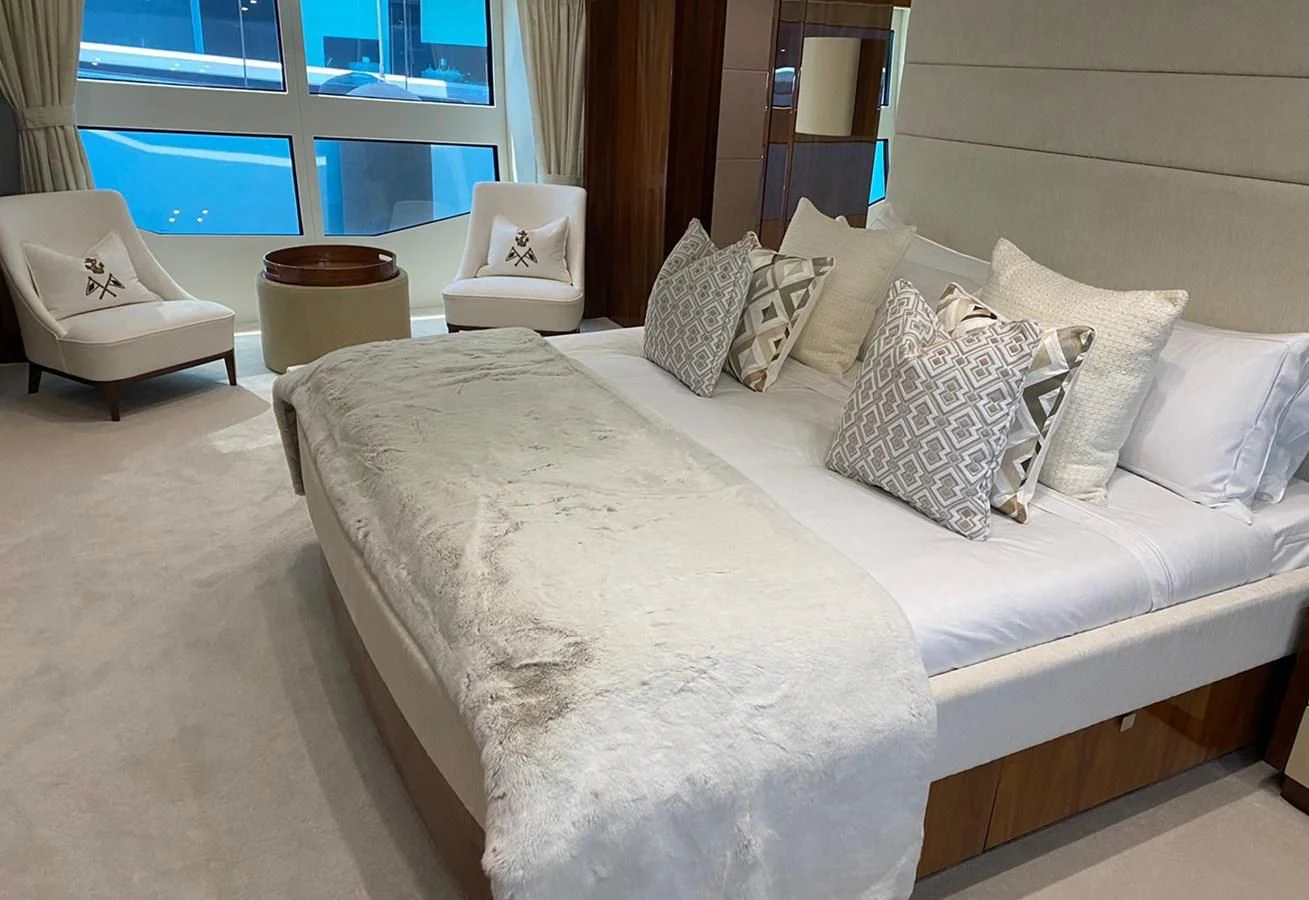 a bed with pillows aboard ANYA Yacht for Sale