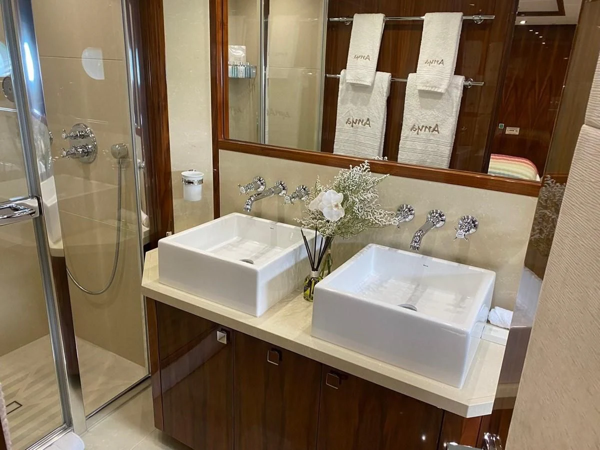 a bathroom with two sinks aboard ANYA Yacht for Sale