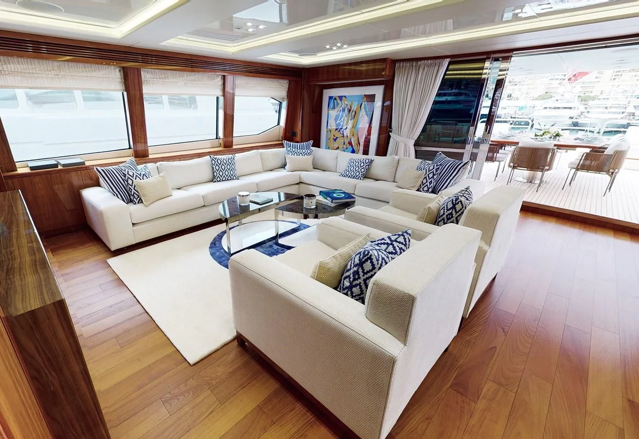 a living room with a couch and a table aboard ANYA Yacht for Sale